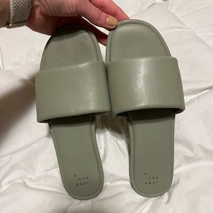 Green slide sandals